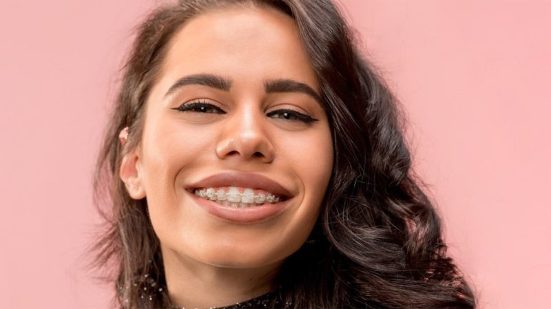 Teenage Girl with braces smiling. Smile at the World Orthodontics in Temple TX.